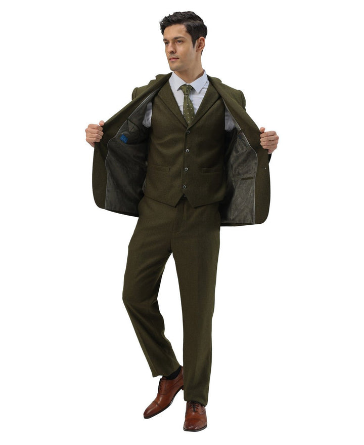 MAN IN OLIVE 3 PIECE SUIT