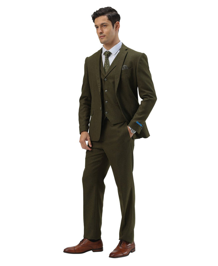 MAN IN 3 PIECE OLIVE SUIT